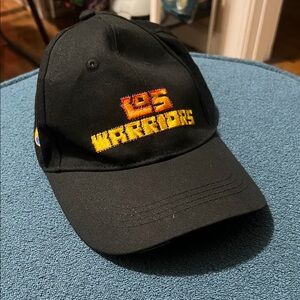 Warriors black SnapBack hat Spanish/English